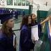 Graduates look at their class photo after their graduation ceremony, Thursday June 6. Courtney Sacco I AnnArbor.com
